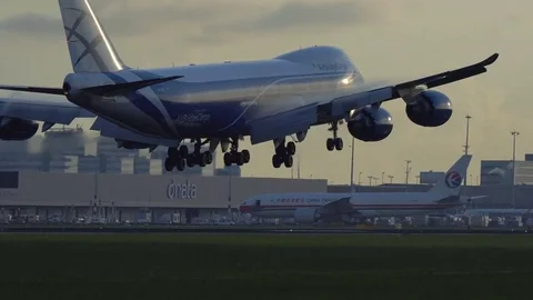 Boeing 747 of AirBridge Cargo landing at sunset Stock Footage 82912153