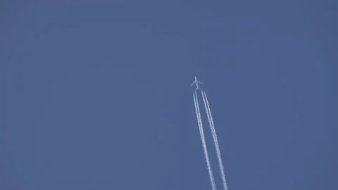 Boeing 747 Jumbojet Passenger Airplane Flying across Blue Sky, Contrail, Clouds Stock Footage 171500282