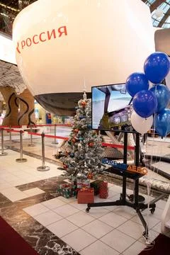A Boeing 747 training simulator for pilots in a shopping mall. The cabin of the Stock Photos