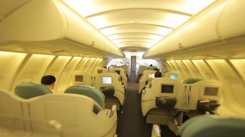 Boeing 747 upstairs first class cabin walk through mid flight Stock Footage 100593677