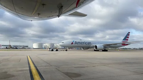 A Boeing 777-300 going to work Stock Footage 165124424