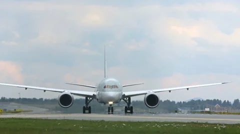 Boeing 787 Dreamliner taxiing at Oslo Airport front view Stock Footage