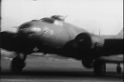 Boeing B-17 Flying Fortress takes off and in flight during a mission - 1944 Stock Footage 103733390