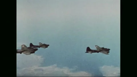 Boeing B-17 Flying Fortresses flying in formation while on the way to Germany Stock Footage