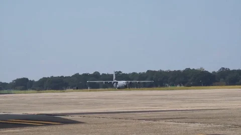 Boeing C - 17 Globemaster III takes off from the runway - 2017 Stock Footage 86380811
