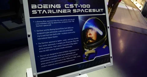 Boeing cst-100 starliner space suit close up on sign Stock Footage 242053978
