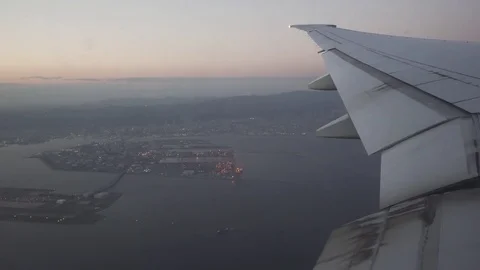 Boeing flies over Osaka Stock-Footage 82466714