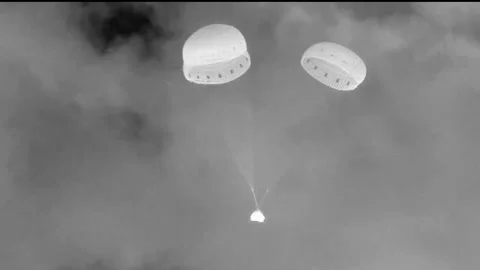 Boeing Starliner spacecraft bottom heatshield jettison for landing Stock Footage 284327472