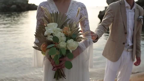Boho bouquet of roses in the hands of the bride. Stock Footage 156576582
