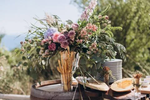 Boho wedding table with eco decor for guests. Stock Photos