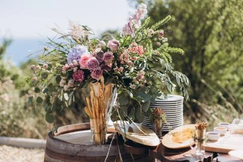Boho wedding table with eco decor for guests. Stock Photos
