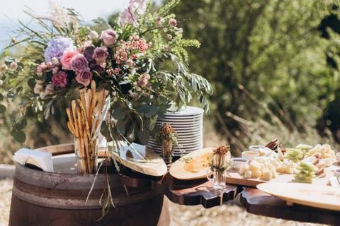 Boho wedding table with eco decor for guests. Stock Photos