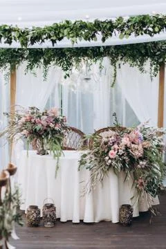 Boho wedding table for a newlywed banquet. Stock Photos