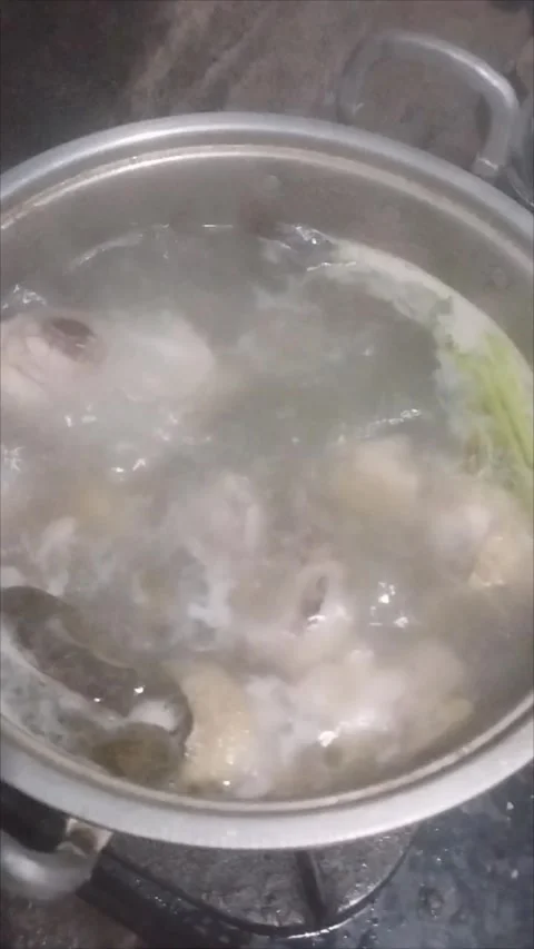 Boil chicken until tender Stock Footage 290985140