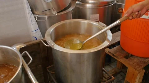 Boil hops in a pot with wort Stock Footage 53301756