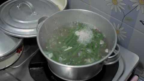 Boil long beans and tomatoes to serve as a side dish for vegetables. Indone.. Stock Footage 241995628