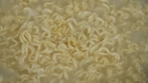 Boil noodle in pot Video stock 73838184