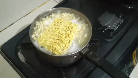 Boil noodles Stock Footage 218411580