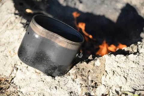 Boil water on an open fire Stock Photos