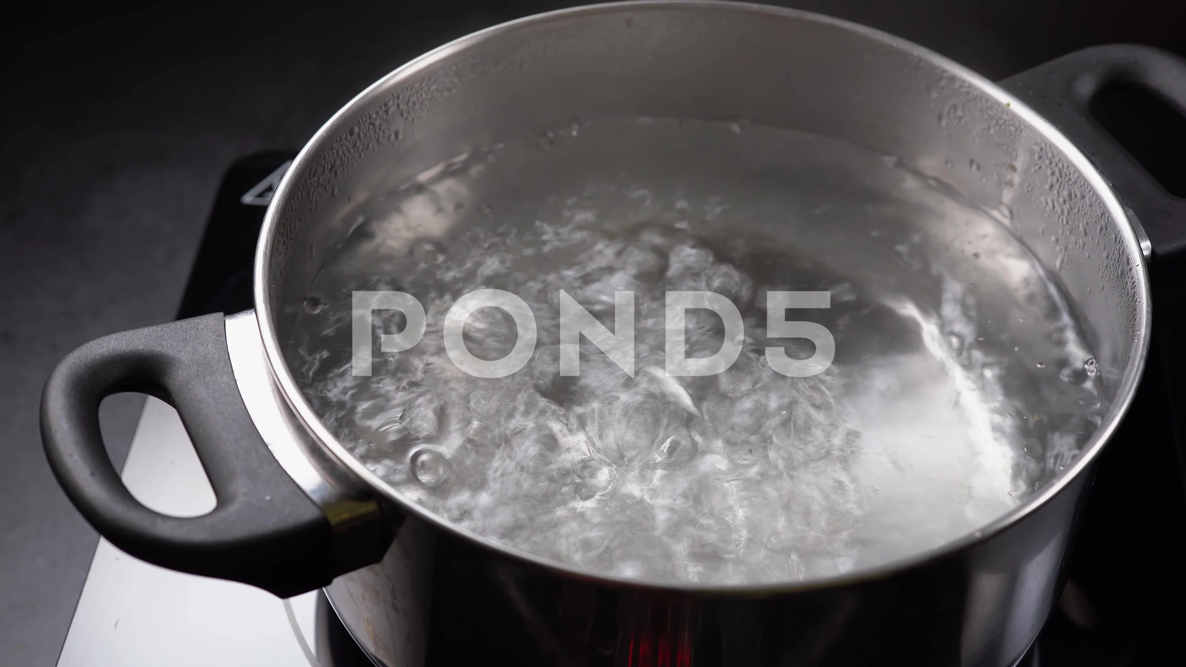 https://images.pond5.com/boil-water-pot-dark-background-footage-141919494_prevstill.jpeg