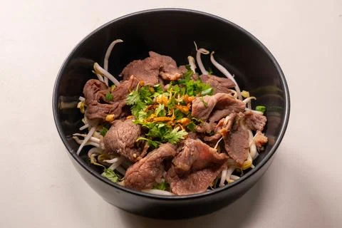 Boiled Beef dip with hot Fotos Stock