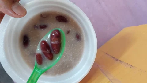 Boiled black bean dessert Stock Footage 265659788