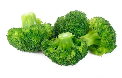 Boiled broccoli vegetable on white background Stock Photos