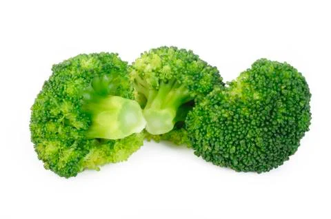 Boiled broccoli vegetable on white background Stock Photos