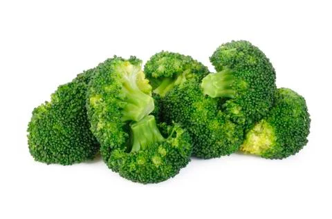 Boiled broccoli vegetable on white background Stock Photos