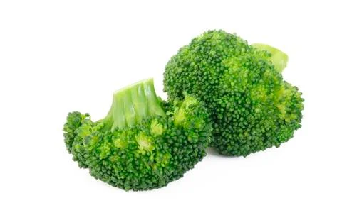 Boiled broccoli vegetable on white background Stock Photos