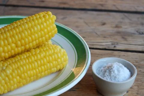 Boiled corn on plate Stock Photos