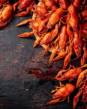Boiled crayfish on a cutting board. Stock Photos