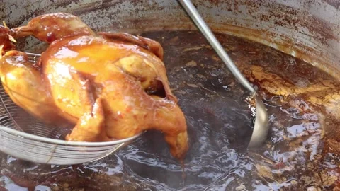 Boiled duck in stew with sauce or stewed duck and hot in stainless pot Stock Footage 141306749