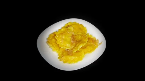 Boiled dumplings in the spinning table isolated on black background in white Stock-Footage 104722029