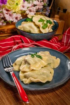 Boiled dumplings stuffed with spinach. Stock Photos