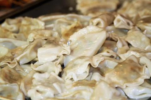 Boiled dumplings on a tray Stock Photos