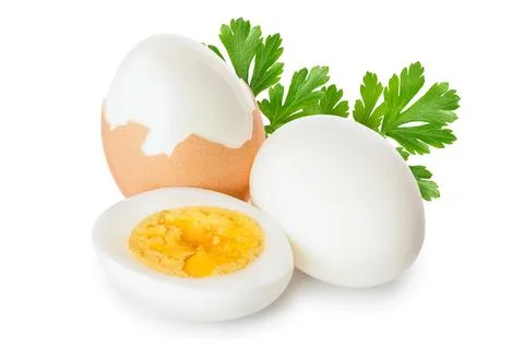 Boiled egg and half isolated on white background Stock Photos