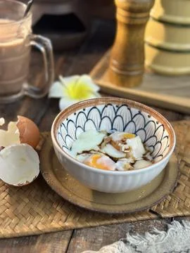 Boiled egg in an bow Stock Photos