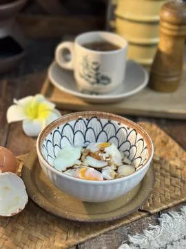 Boiled egg in an bow Stock Photos