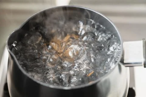Boiled egg cooking close up Stock Photos