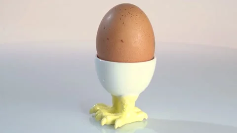 Boiled egg in a cup Stock Footage 157151429