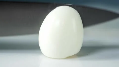 Boiled Egg Cut in Half Stock Footage 318409998