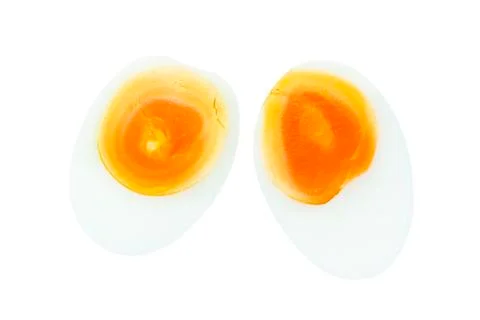Boiled egg with different eggyork half cut on top view Stock Photos