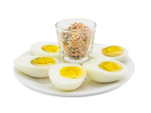 Boiled egg half cut snack with topping shot Stock Photos