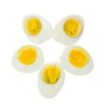 Boiled egg half cut on top view Stock Photos