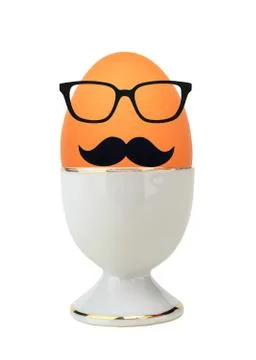 Boiled egg in holder isolated on white Stock Photos