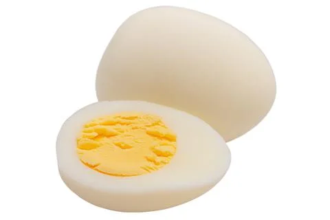 Boiled egg isolate on white. Cut boiled peeled egg. Stock Photos