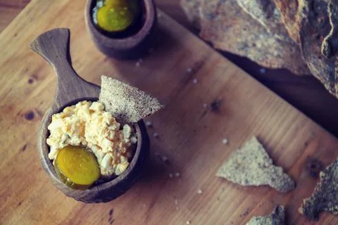 Boiled egg with mayonnaise on thin crispy bread. Traditional Scandinavian Stock Photos