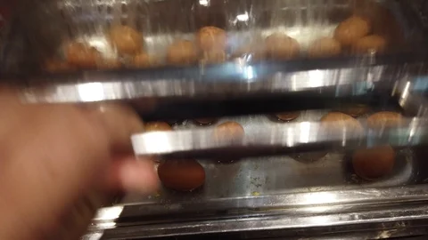 Boiled egg in metallic container- Process of preparation of a breakfast in hotel Stock Footage 116776856