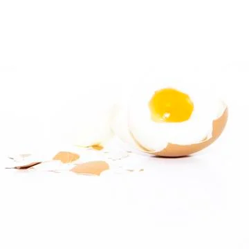 Boiled egg yolk with eggshell Stock Photos